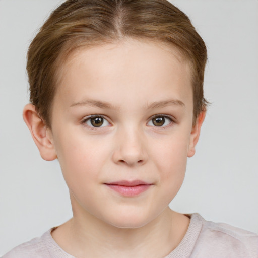 Joyful white child female with short  brown hair and brown eyes