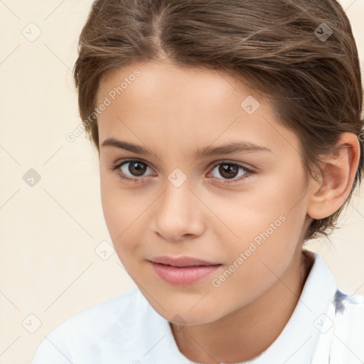 Joyful white child female with medium  brown hair and brown eyes