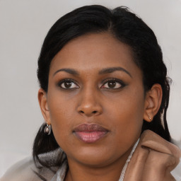 Neutral black young-adult female with medium  brown hair and brown eyes