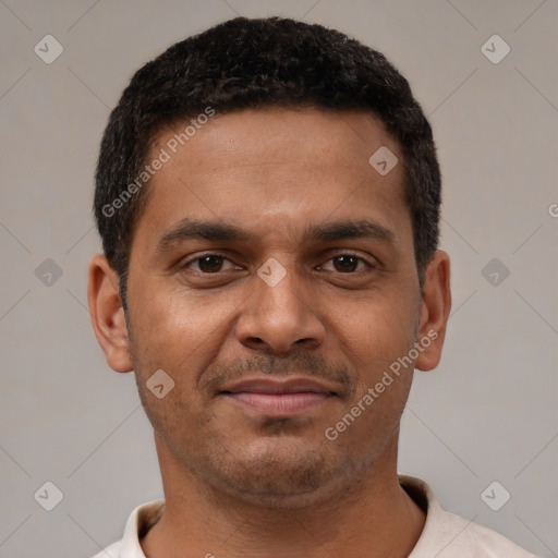 Joyful latino young-adult male with short  brown hair and brown eyes