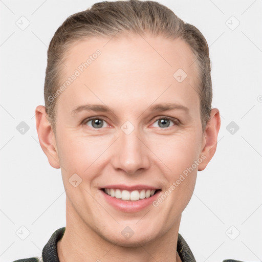 Joyful white young-adult female with short  brown hair and grey eyes