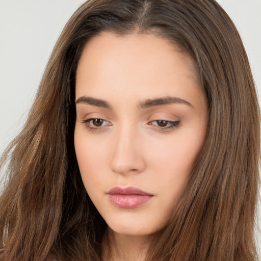 Neutral white young-adult female with long  brown hair and brown eyes