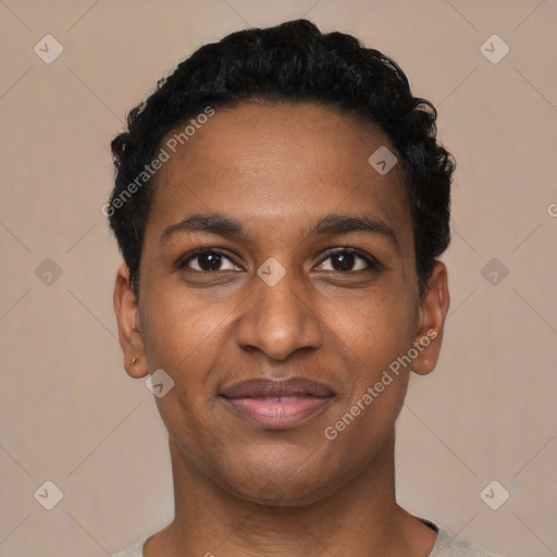 Joyful black young-adult male with short  black hair and brown eyes