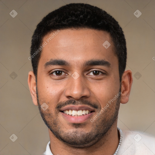 Joyful latino young-adult male with short  black hair and brown eyes