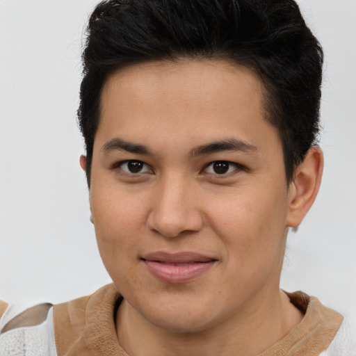 Joyful asian young-adult male with short  brown hair and brown eyes