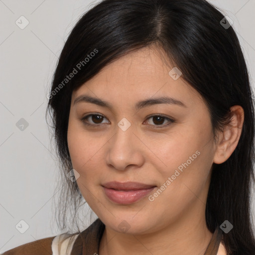 Joyful latino young-adult female with long  brown hair and brown eyes