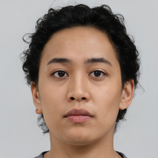 Neutral asian young-adult female with short  brown hair and brown eyes