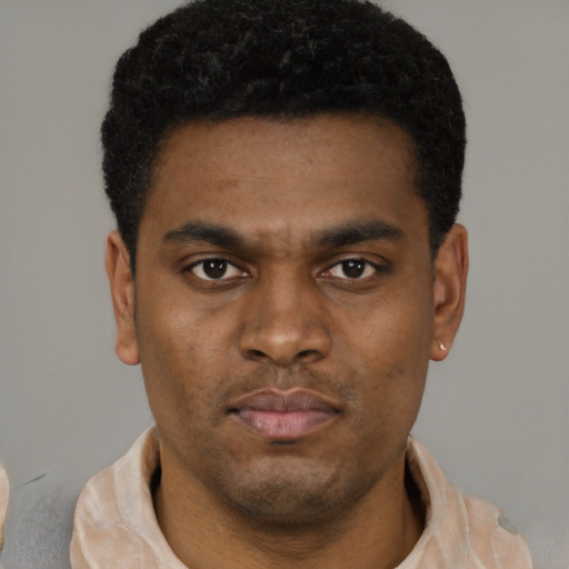 Neutral black young-adult male with short  black hair and brown eyes