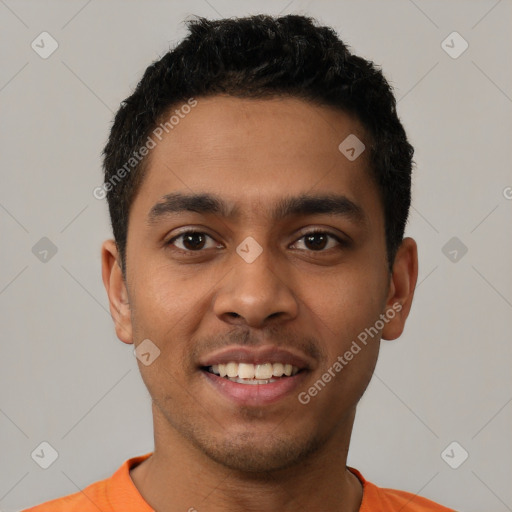 Joyful latino young-adult male with short  black hair and brown eyes