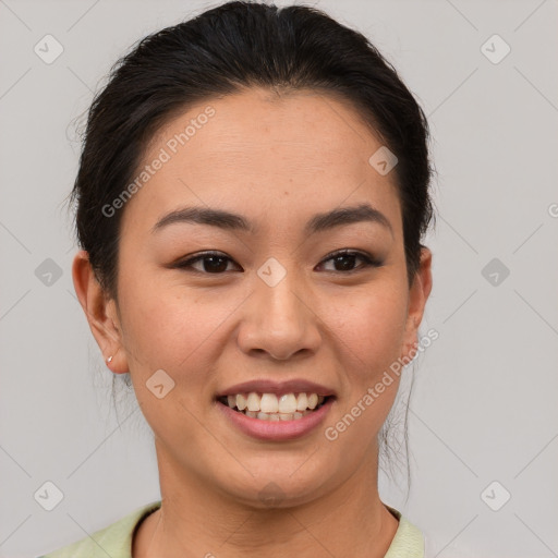 Joyful asian young-adult female with medium  brown hair and brown eyes