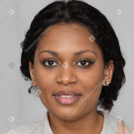 Joyful black young-adult female with medium  black hair and brown eyes