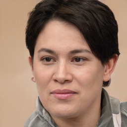 Joyful white adult female with medium  brown hair and brown eyes