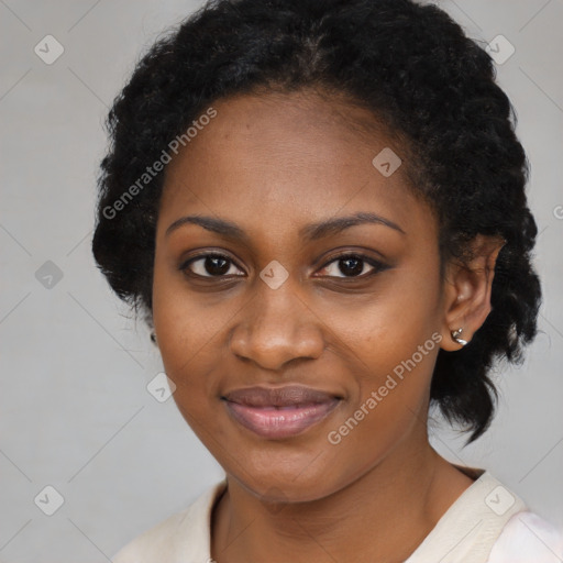 Joyful black young-adult female with medium  black hair and brown eyes