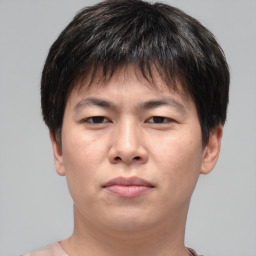 Neutral asian young-adult male with short  brown hair and brown eyes