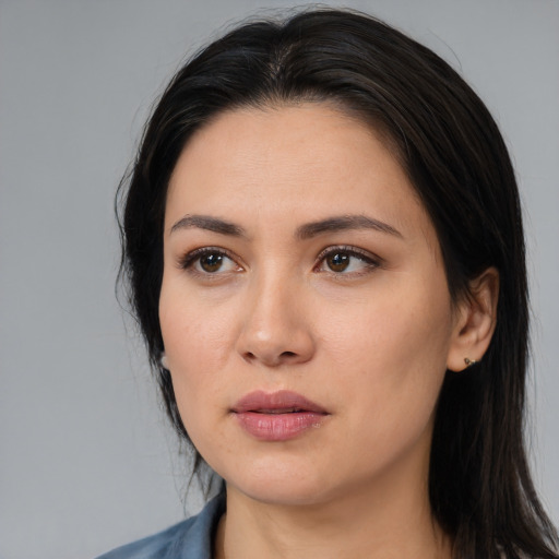 Neutral white young-adult female with medium  black hair and brown eyes