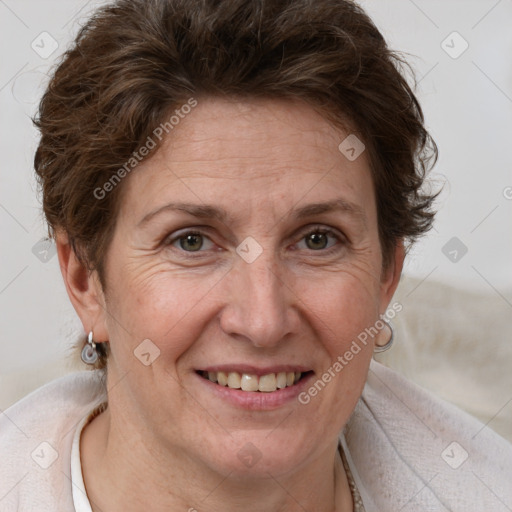 Joyful white adult female with short  brown hair and brown eyes