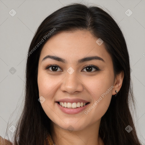 Joyful white young-adult female with long  brown hair and brown eyes