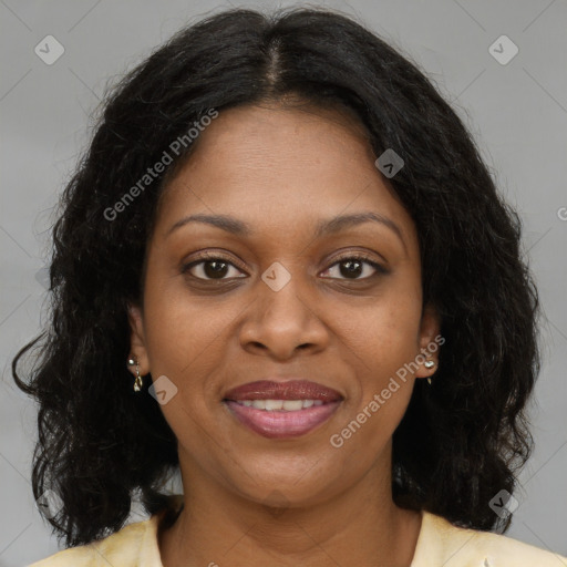 Joyful black young-adult female with medium  brown hair and brown eyes