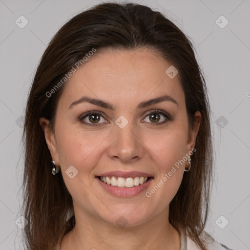 Joyful white young-adult female with long  brown hair and grey eyes