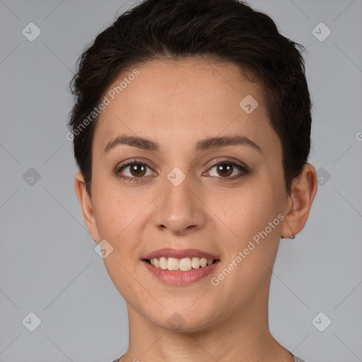 Joyful white young-adult female with short  brown hair and brown eyes