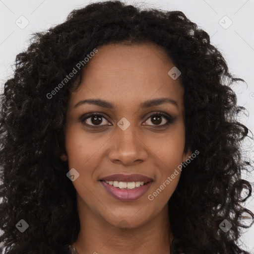 Joyful black young-adult female with long  brown hair and brown eyes