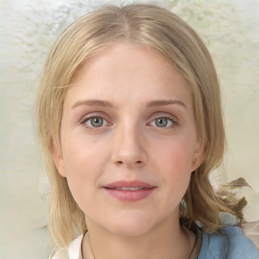 Joyful white young-adult female with medium  brown hair and blue eyes