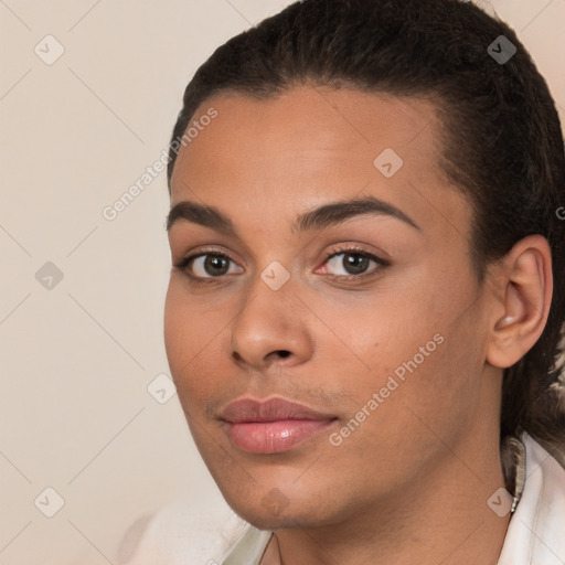 Neutral white young-adult female with short  brown hair and brown eyes