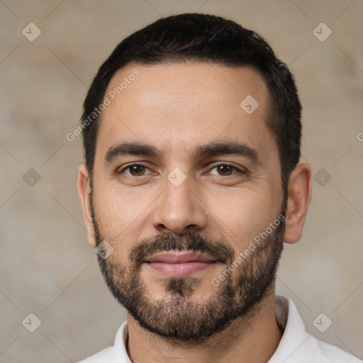 Neutral white young-adult male with short  black hair and brown eyes