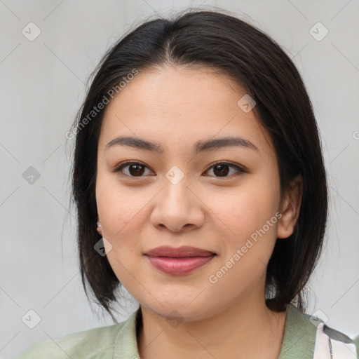 Joyful asian young-adult female with medium  brown hair and brown eyes