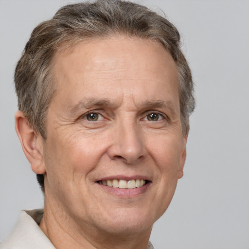 Joyful white middle-aged male with short  brown hair and brown eyes