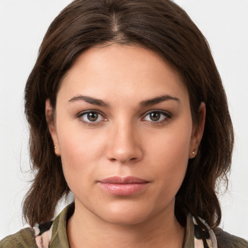 Neutral white young-adult female with medium  brown hair and brown eyes