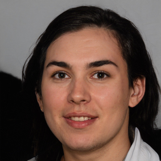 Joyful white young-adult female with medium  black hair and brown eyes