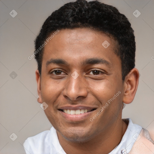 Joyful latino young-adult male with short  brown hair and brown eyes