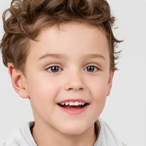 Joyful white child male with short  brown hair and brown eyes