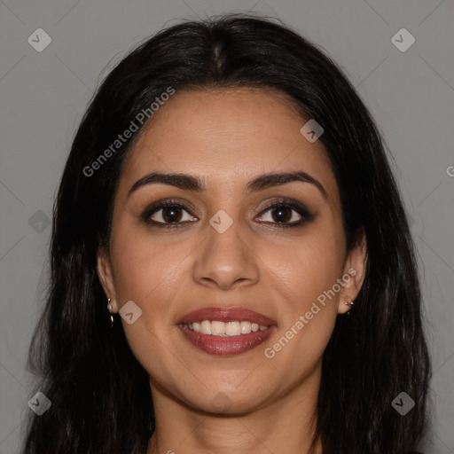 Joyful latino young-adult female with long  brown hair and brown eyes