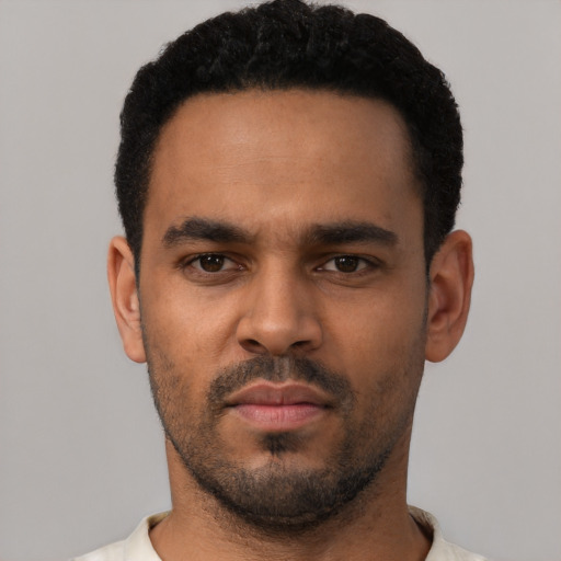 Neutral latino young-adult male with short  black hair and brown eyes