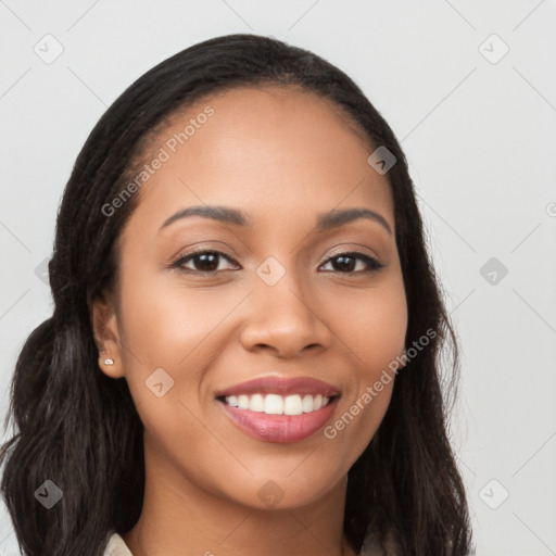 Joyful latino young-adult female with long  brown hair and brown eyes