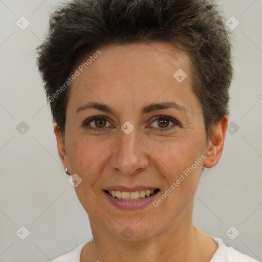 Joyful white adult female with short  brown hair and brown eyes