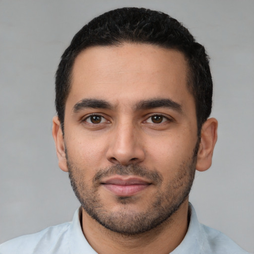Neutral latino young-adult male with short  black hair and brown eyes