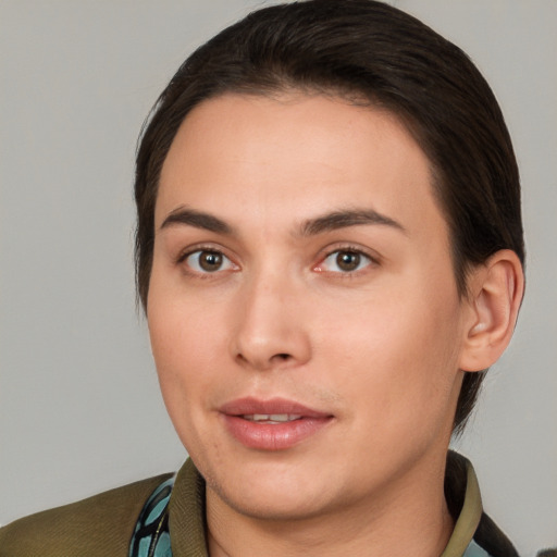 Joyful white young-adult female with short  brown hair and brown eyes