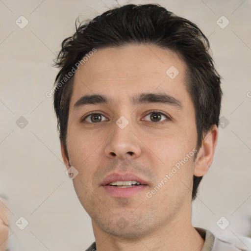 Neutral white young-adult male with short  black hair and brown eyes