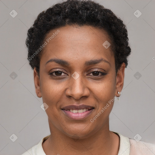 Joyful black young-adult female with short  black hair and brown eyes