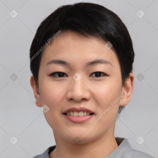 Joyful asian young-adult female with short  black hair and brown eyes