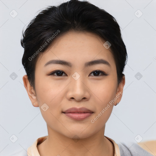 Joyful asian young-adult female with short  black hair and brown eyes