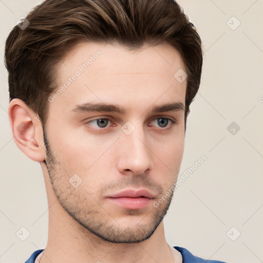 Neutral white young-adult male with short  brown hair and grey eyes