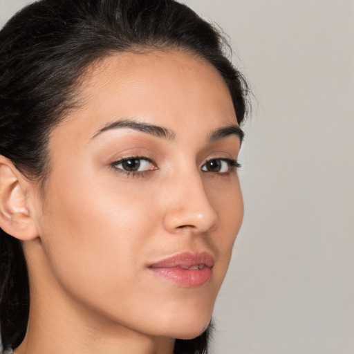 Neutral white young-adult female with medium  brown hair and brown eyes