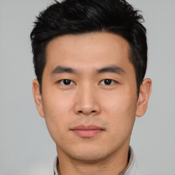 Neutral asian young-adult male with short  black hair and brown eyes