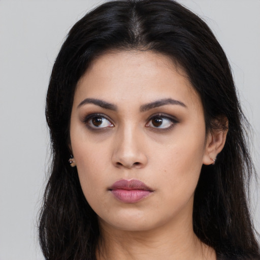 Neutral white young-adult female with long  black hair and brown eyes