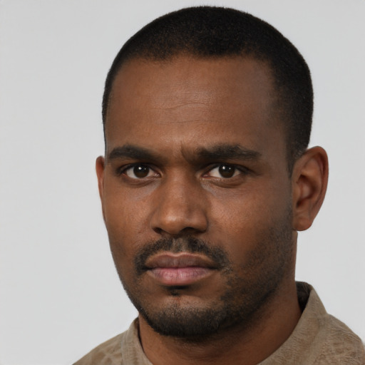 Neutral black young-adult male with short  black hair and brown eyes
