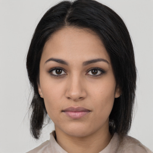 Neutral latino young-adult female with medium  black hair and brown eyes